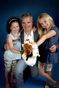 Hannah and Zoe Swerdlick from the Webkinz Webcast with their dad, Dave